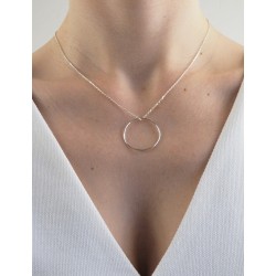 Woman's big silver circle necklace