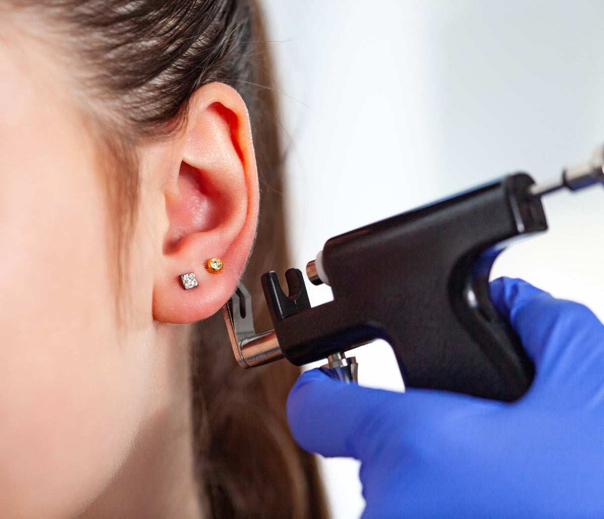 perçage d'oreilles