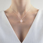 Collier boule rose femme
