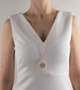 Collier sautoir médaille femme