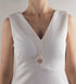 Collier sautoir médaille femme