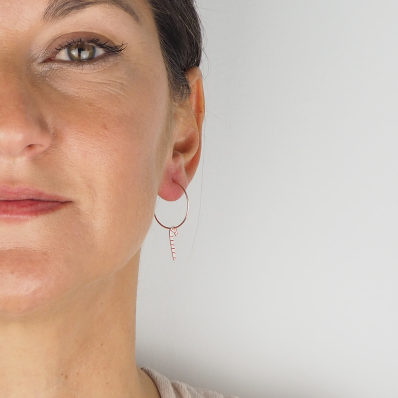 Women's solid silver candy cane hoop earrings