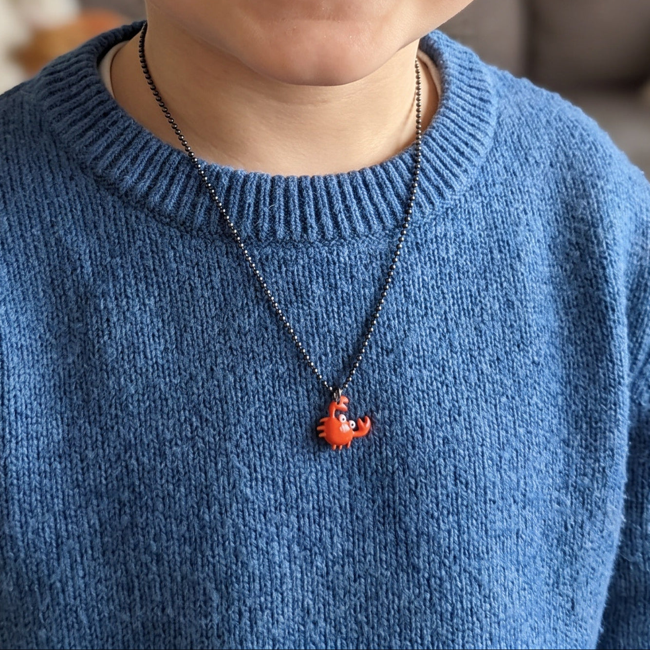Child's crab pendant, orange enamel, gold and yellow