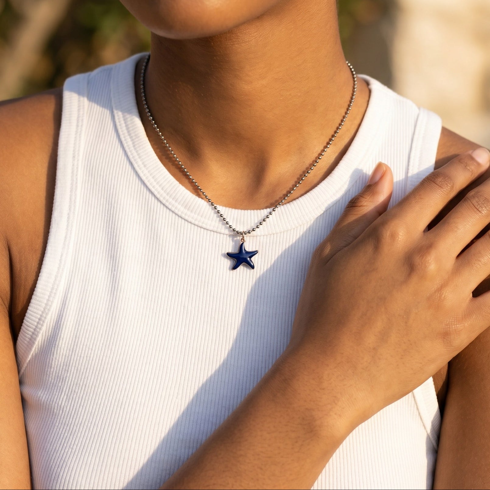 Damesketting van sterling zilver met emaille in de vorm van een zeester