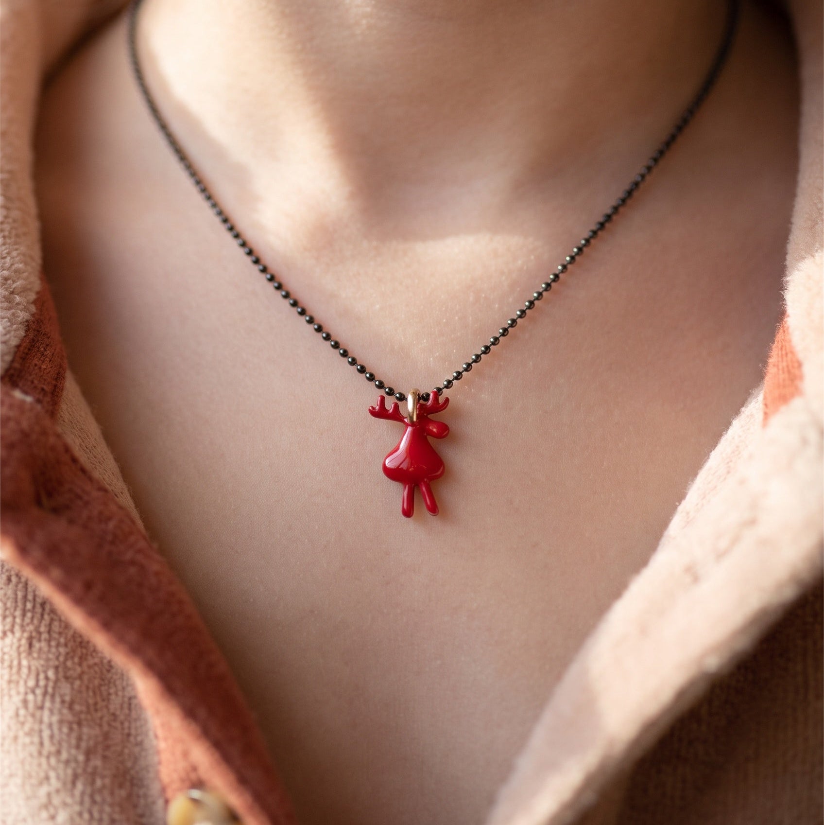 Christmas reindeer pendant for a young girl