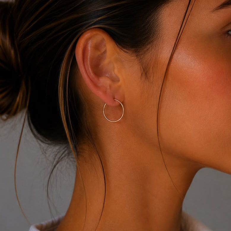Women's delicate rose gold hoop earrings