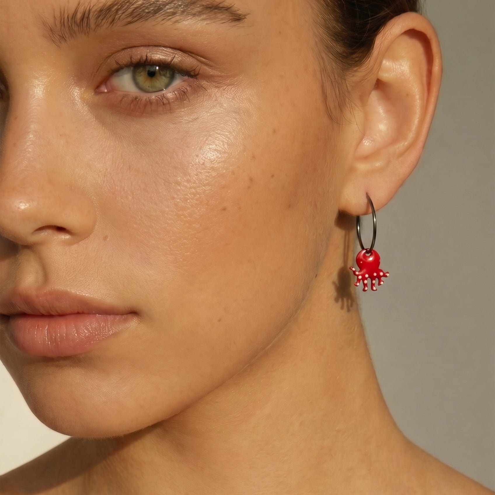 Women's red enamel octopus earrings