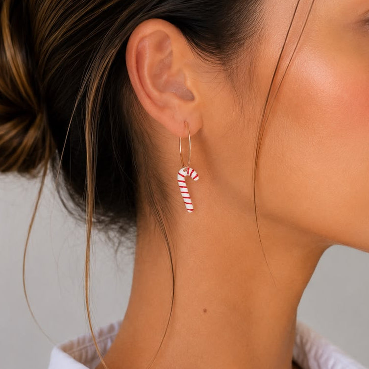 Women's solid silver candy cane hoop earrings